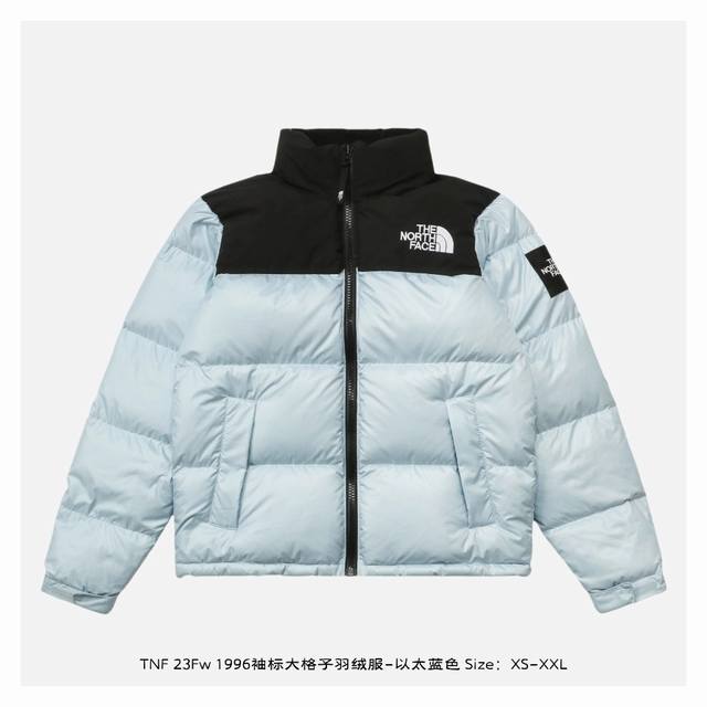 The North Face 北面 23Fw 1996袖标大格子羽绒服-以太蓝色 面料为百分百40D尼丝纺，防水防风，内胆2层，里布一层，一共四层面料，两个颜色