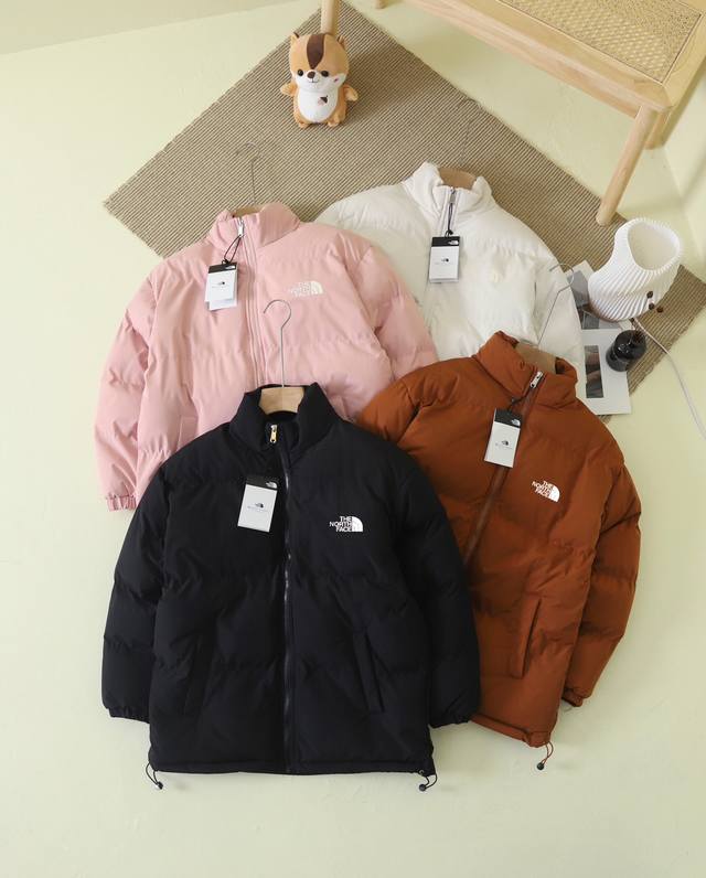 Thenorthface-北面立领宽松休闲冬季情侣百搭棉服加厚外套 优质棉填充:采用柔软厚实填充优质棉，衣身舒适，舒适饱满的优质棉决定了一整件衣服的质感造就了衣