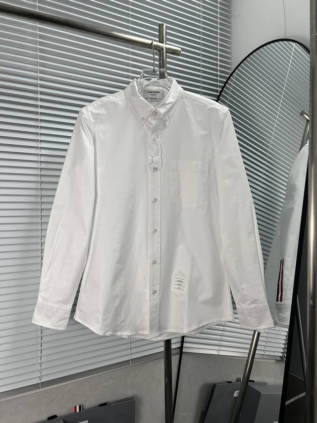 Thom Browne 袖口后织带拼接衬衫 正品定制牛津纺面料 高品质 还原细节 男女同款 采用进口缝纫设备缝制 不缩水、不起球 三标齐 颜色：白色 尺码：0