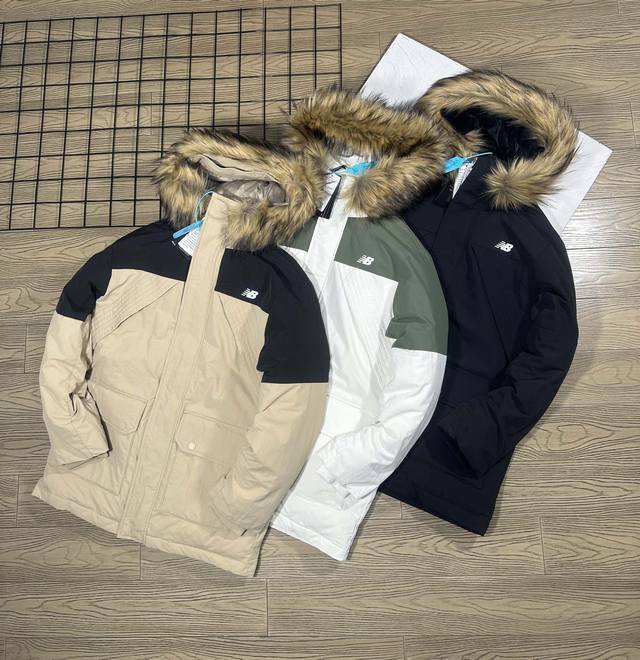 New Balance Nb冬季新男女工装中长款连帽羽绒服 明星同款 一件羽绒服，挑战日系复古、休闲、通勤等！ 寒冷的季节，一款温暖且时尚的羽绒外套简直是解决穿