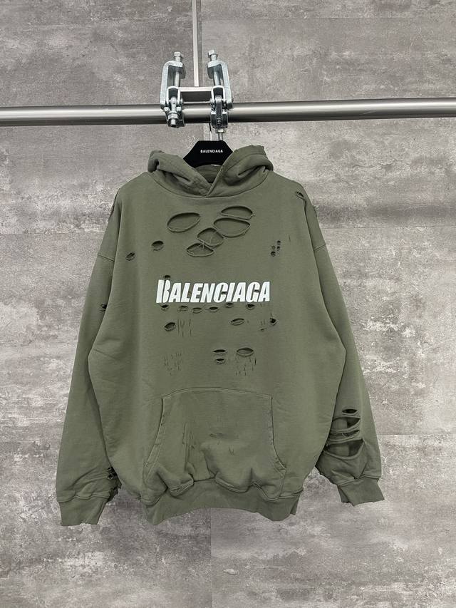 巴黎世家 Balenciaga 字母印花破洞连体帽衫卫衣 绿色 男女同款 尺码表：Xs. S. M. L 印花：印花材料采用安全环保无毒婴儿认证的材料；印花轮廓